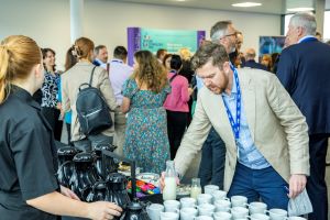 A group of people networking at an event